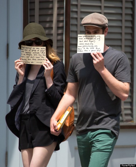 51453647 "The Amazing Spider-man 2" stars Emma Stone and Andrew Garfield share a message to the world after eating breakfast at Cafe Cluny walking on June 17, 2014 in New York City, New York. They couple held notes up over their faces that read: (Emma's card) "Good morning! We were eating and saw a group of guys with cameras outside. And so we thought, let's try this again. We don't need the attention, but these wonderful organizations do: --->" (Andrew's Card) "www.youthmentoring.org, www.autismspeaks.org (and don't forget) www.wwo.org, www.gildasclubnyc.org. Here's to the stuff that matters. Have a great day!" FameFlynet, Inc - Beverly Hills, CA, USA - +1 (818) 307-4813